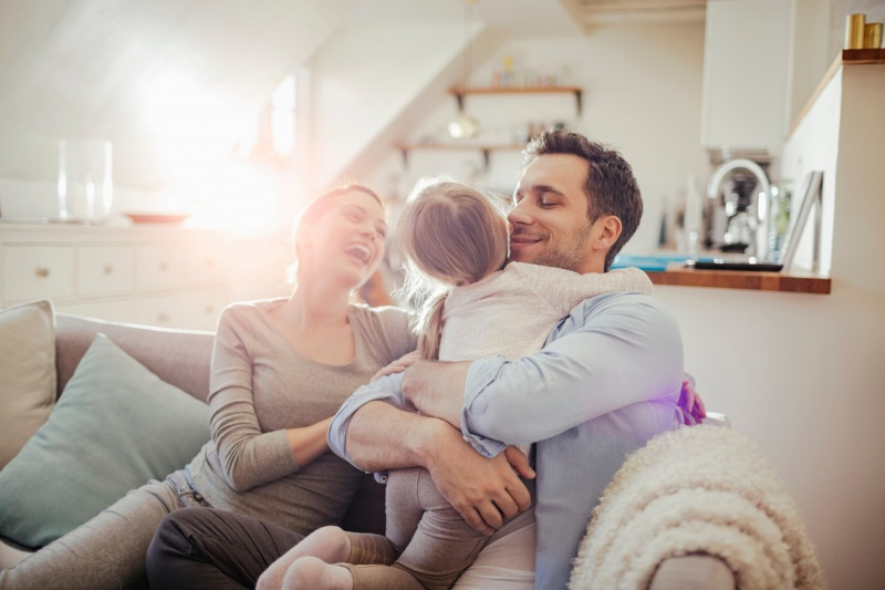 A family comfortably relaxing together
