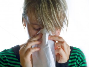 sick-woman-blowing-nose